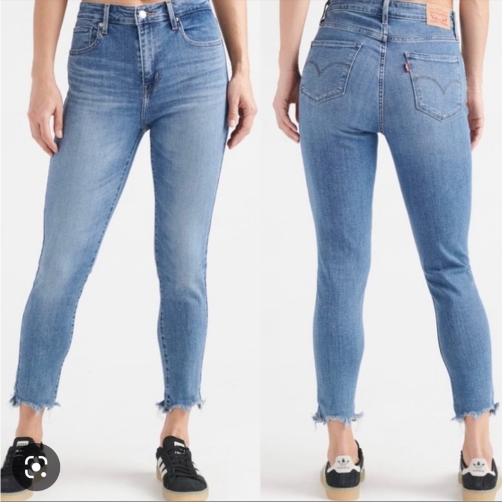 Levis woman’s 721 high rise skinny chewed raw hem blue jean
